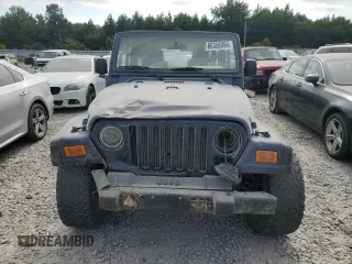 2004 Jeep Wrangler X with VIN 1J4FA39S64P717135, listed as a Copart auction lot 66358954 with 166,948 mi miles and Clean Title. Bid and sale history available at carsss.com. Image 5.