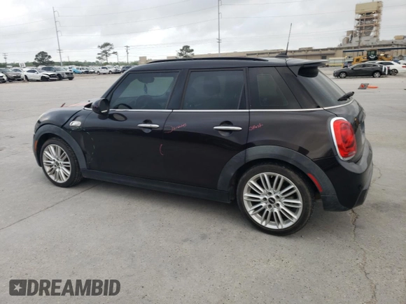 2015 MINI Hardtop 4 Door S with VIN WMWXU3C5XF2B56104, listed as a Copart auction lot 51189075 with 113,586 mi miles and Salvage title. Bid and sale history available at DreamBid. Image 2.