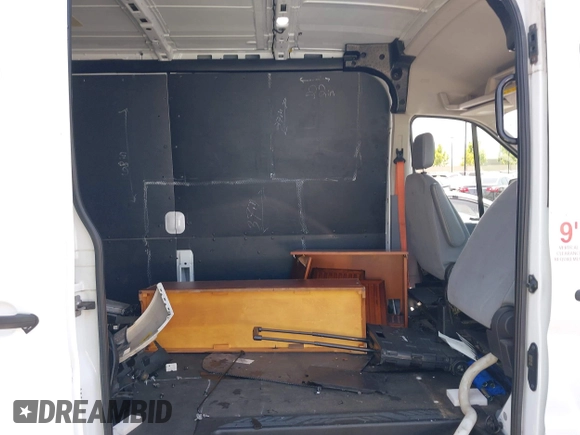 2019 Ford Transit with VIN 1FTYE2CM2KKB51394, listed as a IAAI auction lot 42758326 with 98,813 mi miles and . Bid and sale history available at DreamBid. Image 8.