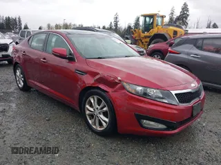 2013 Kia Optima EX z VIN 5XXGN4A72DG202555, wystawiony jako IAAI lot #41977054 z przebiegiem 112 544 mil mil oraz . Historia ofert i sprzedaży dostępna na DreamBid. Obrazek 1.