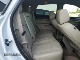 2014 Cadillac SRX Luxury Collection z VIN 3GYFNBE39ES567196, wystawiony jako Copart lot #55326075 z przebiegiem 98 942 mil mil oraz Szkody całkowita. Historia ofert i sprzedaży dostępna na DreamBid. Obrazek 11.