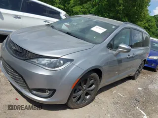 2018 Chrysler Pacifica Touring L with VIN 2C4RC1BG5JR165418, listed as a IAAI auction lot 42143241 with 157,768 mi miles and . Bid and sale history available at DreamBid. Image 16.