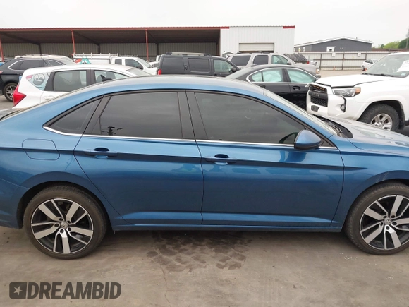 2020 Volkswagen Jetta S z VIN 3VWN57BU4LM048390, wystawiony jako IAAI lot #41946185 z przebiegiem 94 140 mil mil oraz . Historia ofert i sprzedaży dostępna na DreamBid. Obrazek 13.