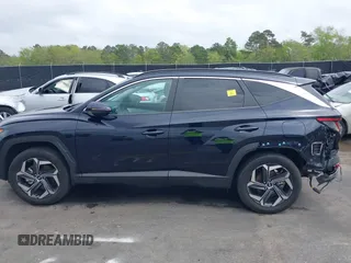 2022 Hyundai Tucson SEL Convenience with VIN KM8JFCA10NU049450, listed as a IAAI auction lot 41915300 with 23,584 mi miles and . Bid and sale history available at carsss.com. Image 14.