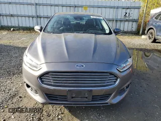 2013 Ford Fusion SE Hybrid with VIN 3FA6P0LU8DR184555, listed as a Copart auction lot 52108905 with 80,505 mi miles and Salvage Title. Bid and sale history available at DreamBid. Image 5.