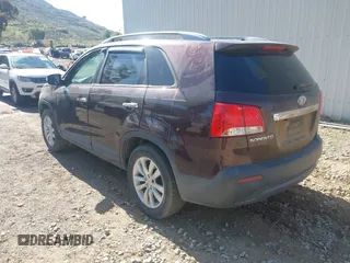 2011 Kia Sorento EX with VIN 5XYKU4A20BG001554, listed as a IAAI auction lot 41954009 with 119,323 mi miles. Bid and sale history available at carsss.com. Image 3.