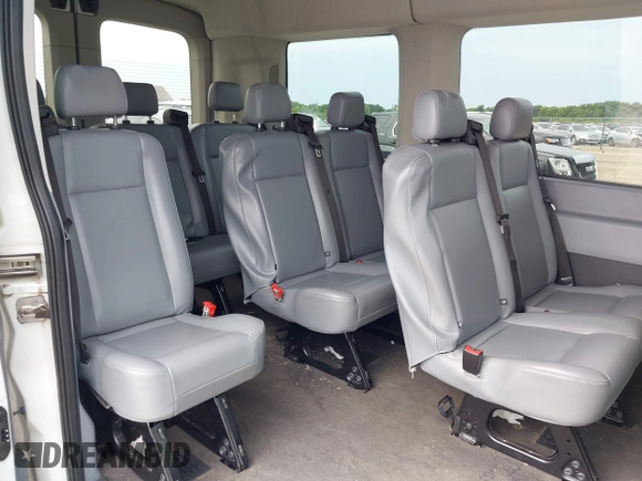 2017 Ford Transit Passenger XL z VIN 1FMZK1CM9HKA28283, wystawiony jako IAAI lot #39970695 z przebiegiem 151 916 mil mil oraz . Historia ofert i sprzedaży dostępna na DreamBid. Obrazek 7.