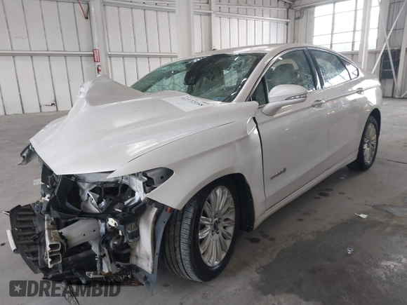 2013 Ford Fusion SE Hybrid with VIN 3FA6P0LU8DR357054, listed as a IAAI auction lot 42372168 with 143,979 mi miles and . Bid and sale history available at DreamBid. Image 17.