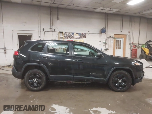 2016 Jeep Cherokee Sport with VIN 1C4PJMAS9GW268040, listed as a IAAI auction lot 41241844 with 102,211 mi miles and . Bid and sale history available at DreamBid. Image 13.