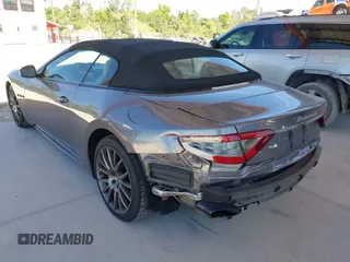 2019 Maserati GranTurismo Convertible Sport with VIN ZAM45VMA3K0318440, listed as a IAAI auction lot 41843305 with 14,296 mi miles. Bid and sale history available at carsss.com. Image 3.