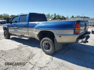 2003 GMC Sierra 3500 SLT z VIN 1GTJC33113F121042, wystawiony jako Copart lot #73668454 z przebiegiem 246 510 mil mil oraz Szkody całkowita. Historia ofert i sprzedaży dostępna na DreamBid. Obrazek 2.