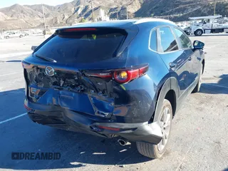 2023 Mazda CX-30 S Select with VIN 3MVDMBBM8PM514475, listed as a IAAI auction lot 41664456 with 33,076 mi miles and . Bid and sale history available at DreamBid. Image 4.