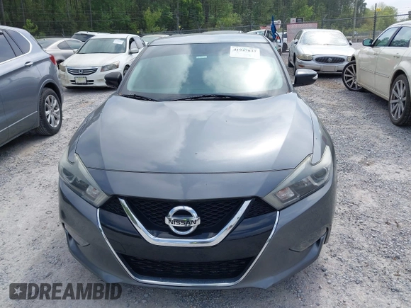 2018 Nissan Maxima SL with VIN 1N4AA6AP6JC385831, listed as a IAAI auction lot 41947837 with 108,714 mi miles and . Bid and sale history available at DreamBid. Image 12.