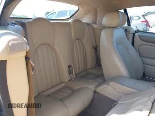 2002 Jaguar XK with VIN SAJDA42C12NA30499, listed as a IAAI auction lot 41954577 with 77,152 mi miles and . Bid and sale history available at DreamBid. Image 8.