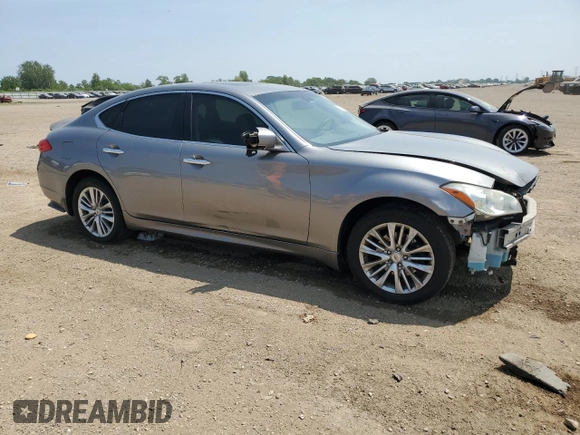 2012 Infiniti M with VIN JN1BY1AR3CM392914, listed as a Copart auction lot 60997925 with 154,801 mi miles and Salvage title. Bid and sale history available at DreamBid. Image 4.