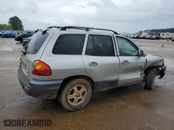 2004 Hyundai Santa Fe z VIN KM8SB12B84U825804, wystawiony jako Copart lot #51107585 z przebiegiem 229 942 mil mil oraz Szkoda całkowita • Salvage title. Historia ofert i sprzedaży dostępna na DreamBid. Obrazek 3.