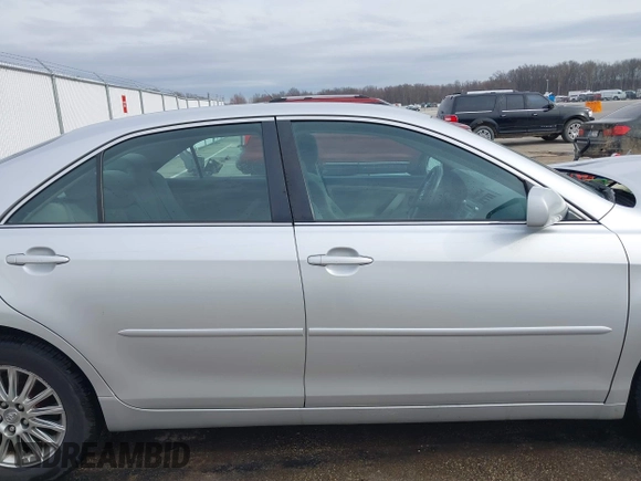 2009 Toyota Camry LE with VIN 4T1BK46K39U581157, listed as a IAAI auction lot 41827143 with 107,664 mi miles. Bid and sale history available at carsss.com. Image 14.