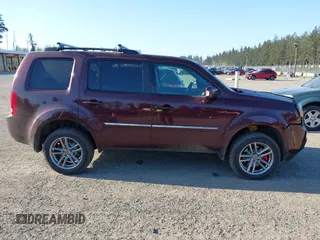 2014 Honda Pilot Touring with VIN 5FNYF4H93EB502117, listed as a IAAI auction lot 42086774 with 111,003 mi miles and . Bid and sale history available at carsss.com. Image 14.