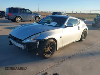 2014 Nissan 370Z Nismo with VIN JN1AZ4EH4EM634236, listed as a IAAI auction lot 41256664 with 80,294 mi miles and . Bid and sale history available at DreamBid. Image 16.