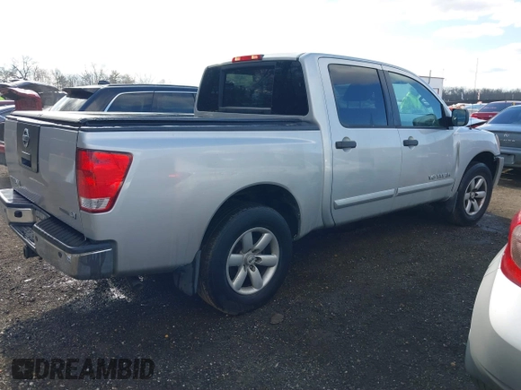 2012 Nissan Titan SV with VIN 1N6BA0EDXCN307763, listed as a IAAI auction lot 41689603 with 172,571 mi miles and . Bid and sale history available at DreamBid. Image 4.
