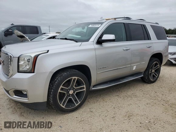 2015 GMC Yukon Denali with VIN 1GKS1CKJ5FR654613, listed as a Copart auction lot 74802474 with 140,288 mi miles and Non Repairable. Bid and sale history available at carsss.com. Image 1.