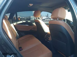 2019 BMW X6 sDrive35i with VIN 5UXKU0C57K0S97581, listed as a IAAI auction lot 41322568 with 76,635 mi miles. Bid and sale history available at carsss.com. Image 8.
