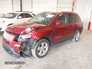 2016 Jeep Compass Latitude z VIN 1C4NJDEB5GD573256, wystawiony jako IAAI lot #42372586 z przebiegiem 47 920 mil mil oraz . Historia ofert i sprzedaży dostępna na DreamBid. Obrazek 2.