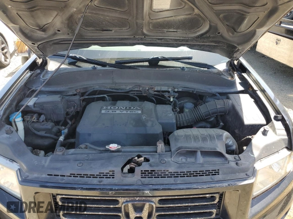 2006 Honda Ridgeline RTL with VIN 2HJYK16596H566552, listed as a Copart auction lot 57516525 with 192,023 mi miles and Salvage Title. Bid and sale history available at DreamBid. Image 11.