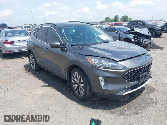 2020 Ford Escape Titanium with VIN 1FMCU9J94LUB19570, listed as a IAAI auction lot 42134031 with 110,248 mi miles and . Bid and sale history available at DreamBid. Image 1.