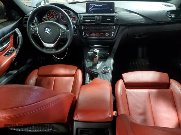 2014 BMW 3 Series 335i xDrive with VIN WBA3B9C59EP458568, listed as a Copart auction lot 61133085 with 177,009 mi miles and Salvage title. Bid and sale history available at DreamBid. Image 8.