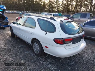 1999 Ford Taurus SE Standard with VIN 1FAFP58U5XG200924, listed as a IAAI auction lot 41501093 with 105,102 mi miles and . Bid and sale history available at DreamBid. Image 3.