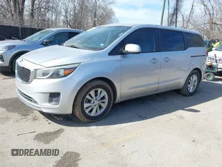 2016 Kia Sedona L with VIN KNDMA5C17G6103195, listed as a IAAI auction lot 41663528 with 322,257 mi miles. Bid and sale history available at carsss.com. Image 2.