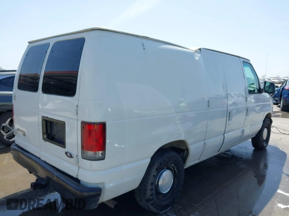 1998 Ford Econoline Cargo with VIN 1FTRE1420WHB15038, listed as a IAAI auction lot 41826051 with 338,809 mi miles. Bid and sale history available at carsss.com. Image 4.