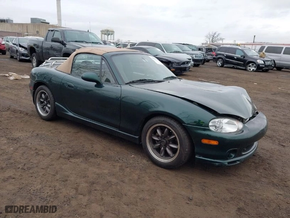 2000 Mazda MX-5 Miata with VIN JM1NB3536Y0150274, listed as a IAAI auction lot 41685970 with 128,492 mi miles. Bid and sale history available at carsss.com. Image 1.