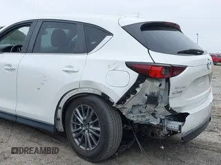 2017 Mazda CX-5 Touring with VIN JM3KFACL8H0205717, listed as a IAAI auction lot 41173725 with 107,604 mi miles. Bid and sale history available at carsss.com. Image 6.