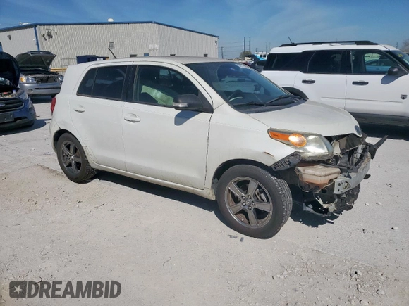 2012 Scion xD with VIN JTKKU4B46C1017963, listed as a Copart auction lot 49777595 with 118,606 mi miles and Salvage Title. Bid and sale history available at DreamBid. Image 4.