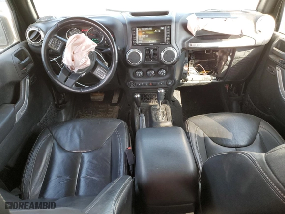2015 Jeep Wrangler Unlimited Rubicon Hard Rock with VIN 1C4HJWFG4FL676868, listed as a Copart auction lot 48489525 with 100,771 mi miles and Salvage Title. Bid and sale history available at carsss.com. Image 8.