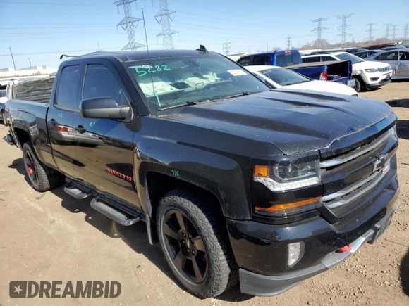 2017 Chevrolet Silverado 1500 LT with VIN 1GCVKREC6HZ345662, listed as a Copart auction lot 53331815 with 121,081 mi miles and Salvage Title. Bid and sale history available at DreamBid. Image 4.