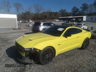 2021 Ford Mustang GT z VIN 1FA6P8CF3M5147061, wystawiony jako IAAI lot #41588962 z przebiegiem 39 201 mil mil oraz . Historia ofert i sprzedaży dostępna na DreamBid. Obrazek 18.