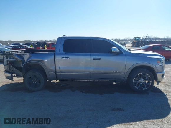 2019 Ram 1500 Limited z VIN 1C6SRFHTXKN774690, wystawiony jako IAAI lot #41860299 z przebiegiem 134 857 mil mil oraz . Historia ofert i sprzedaży dostępna na DreamBid. Obrazek 13.