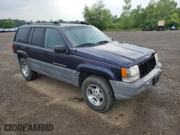1998 Jeep Grand Cherokee Laredo with VIN 1J4GZ58SXWC144437, listed as a Copart auction lot 60437094 with 183,908 mi miles and Salvage Title. Bid and sale history available at carsss.com. Image 4.