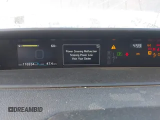 2022 Toyota Prius L Eco with VIN JTDKAMFUXN3188930, listed as a IAAI auction lot 42275661 with 116,934 mi miles and . Bid and sale history available at DreamBid. Image 7.