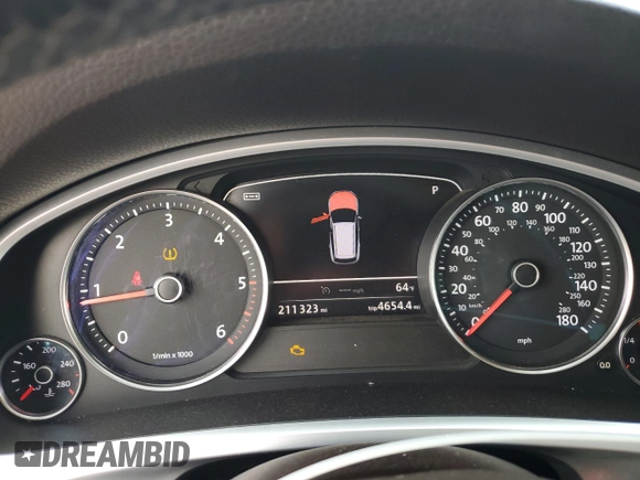 2013 Volkswagen Touareg Sport с VIN WVGEP9BP9DD003974, выставлен на аукционе Copart как лот 75106234 с пробегом 211 323 миль миль и Чистый • Clean title. История ставок и продаж доступна на DreamBid. Изображение 9.