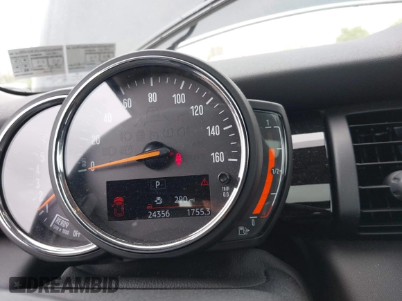 2020 MINI Hardtop Cooper S z VIN WMWXR5C00L2L44737, wystawiony jako IAAI lot #42091511 z przebiegiem 24 356 mil mil oraz . Historia ofert i sprzedaży dostępna na DreamBid. Obrazek 16.