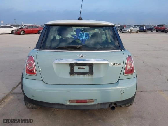 2013 MINI Cooper Hardtop with VIN WMWSU3C58DT683217, listed as a IAAI auction lot 41787402 with 148,803 mi miles. Bid and sale history available at carsss.com. Image 16.