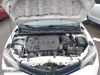 2019 Toyota Corolla L with VIN 5YFBURHE6KP937090, listed as a IAAI auction lot 42041637 with 129,138 mi miles. Bid and sale history available at carsss.com. Image 10.