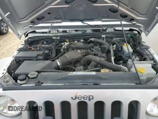 2009 Jeep Wrangler X with VIN 1J4FA24199L787574, listed as a Copart auction lot 58189835 with 74,331 mi miles and Salvage title. Bid and sale history available at DreamBid. Image 12.