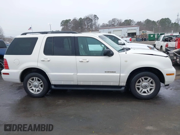 2002 Mercury Mountaineer Convenience z VIN 4M2ZU86W12ZJ35003, wystawiony jako IAAI lot #41193635 z przebiegiem 168 601 mil mil oraz . Historia ofert i sprzedaży dostępna na DreamBid. Obrazek 13.
