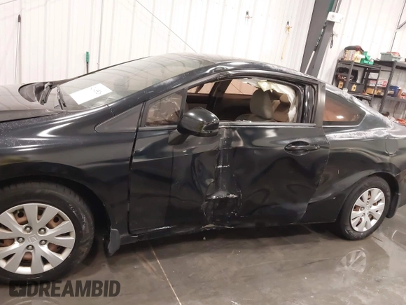 2012 Honda Civic Cpe LX with VIN 2HGFG3B55CH559433, listed as a IAAI auction lot 42045526 with 152,159 mi miles. Bid and sale history available at carsss.com. Image 6.