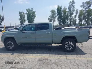 2022 Toyota Tacoma SR5 with VIN 3TMBZ5DN1NM035572, listed as a IAAI auction lot 42083925 with 82,596 mi miles and . Bid and sale history available at DreamBid. Image 15.